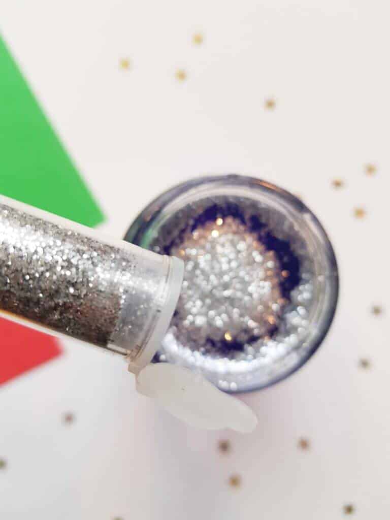 add glitter to sensory jar