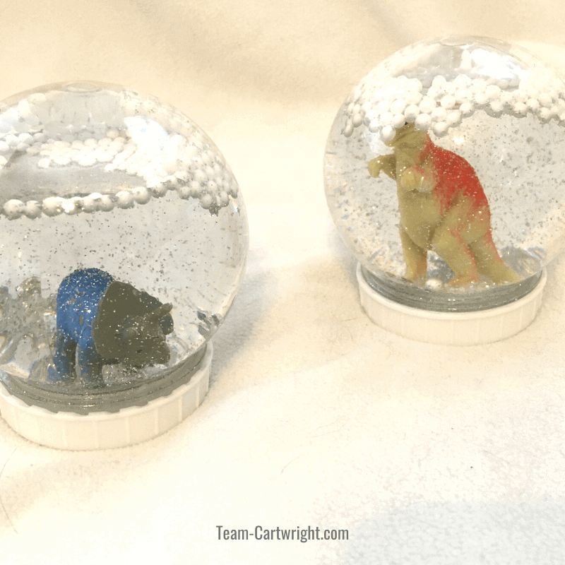 dinosaur snow globe